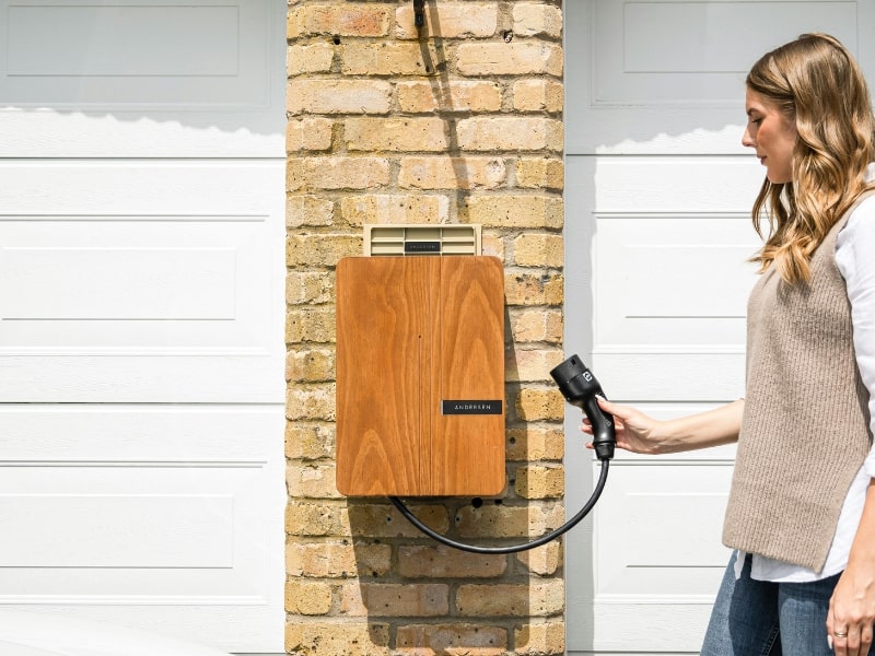 A-women-holding-home-EV-charger