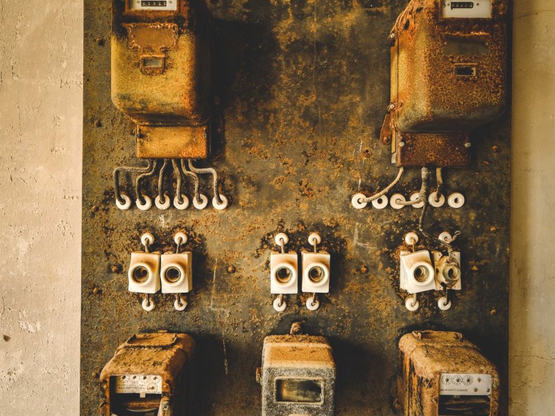 Outdated fuse box with old style fuses in need of an upgrade